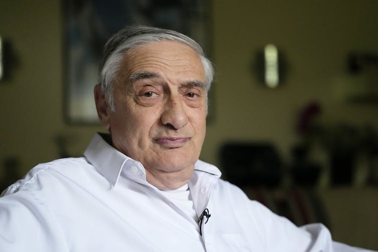 Economist Joel Mokyr poses for a photo at his home