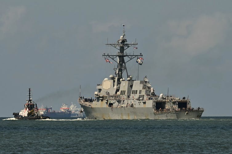 A large ship is seen at sea.