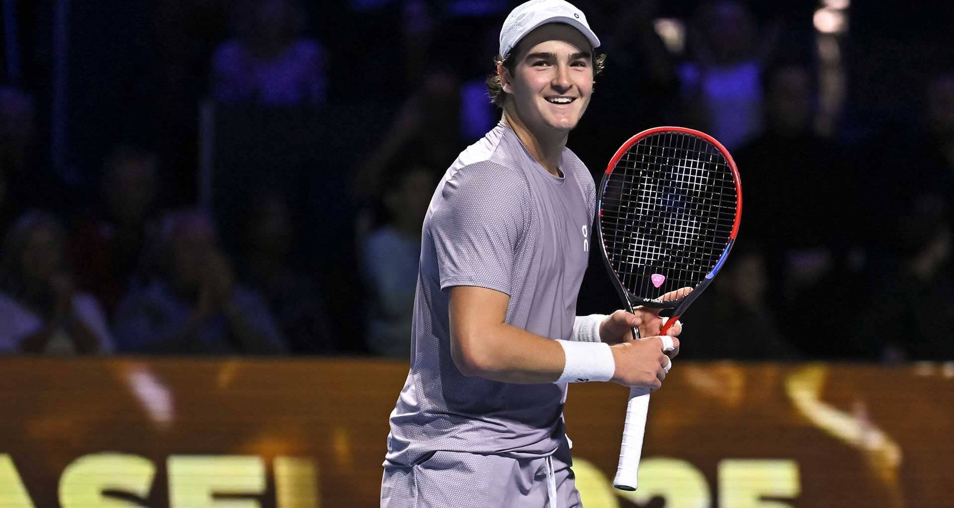 Joao Fonseca looks toward his parents after winning the title in Basel on Sunday.