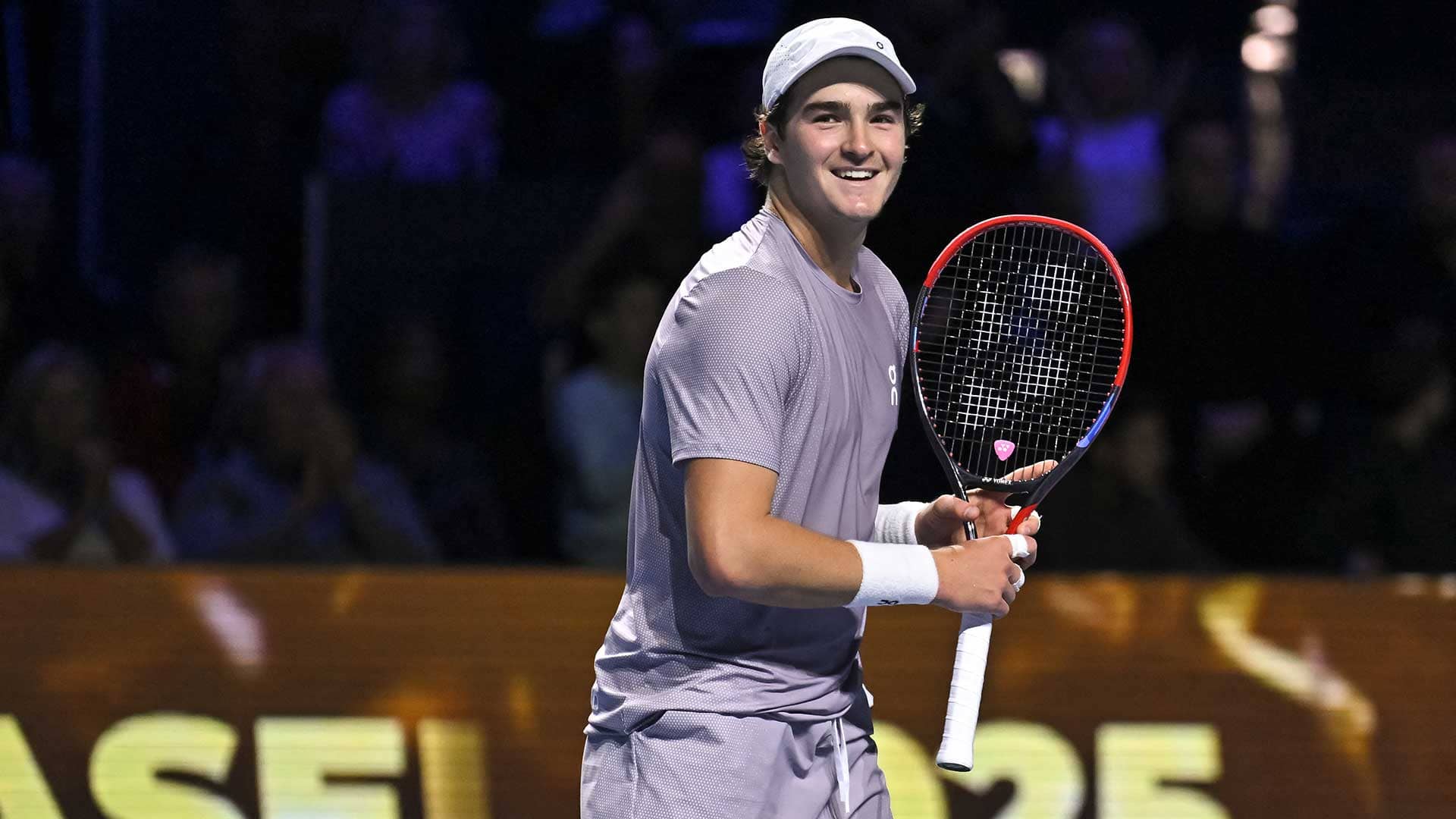 Joao Fonseca looks toward his parents after winning the title in Basel on Sunday.