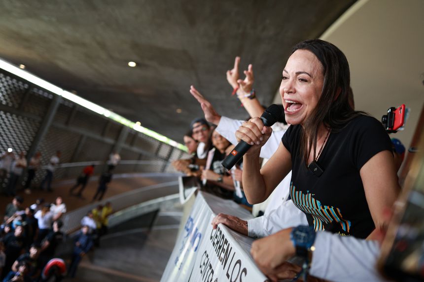 Opposition leader Maria Corina Machado gives a speech with opposition candidate Edmundo Gonzalez Urrutia, during a rally at Universidad Central de Venezuela on July 14, 2024 in Caracas, Venezuela.