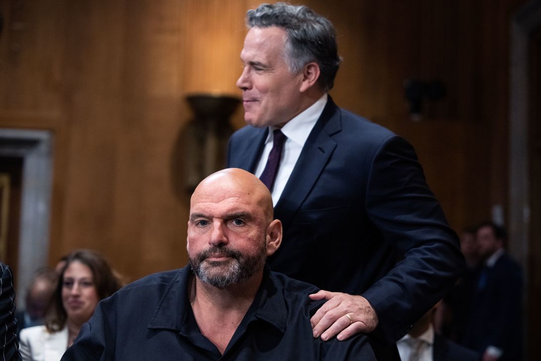 Sens. John Fetterman, foreground, and David McCormick attend a Senate Foreign Relations Committee confirmation hearing in Washington, DC, on July 9.