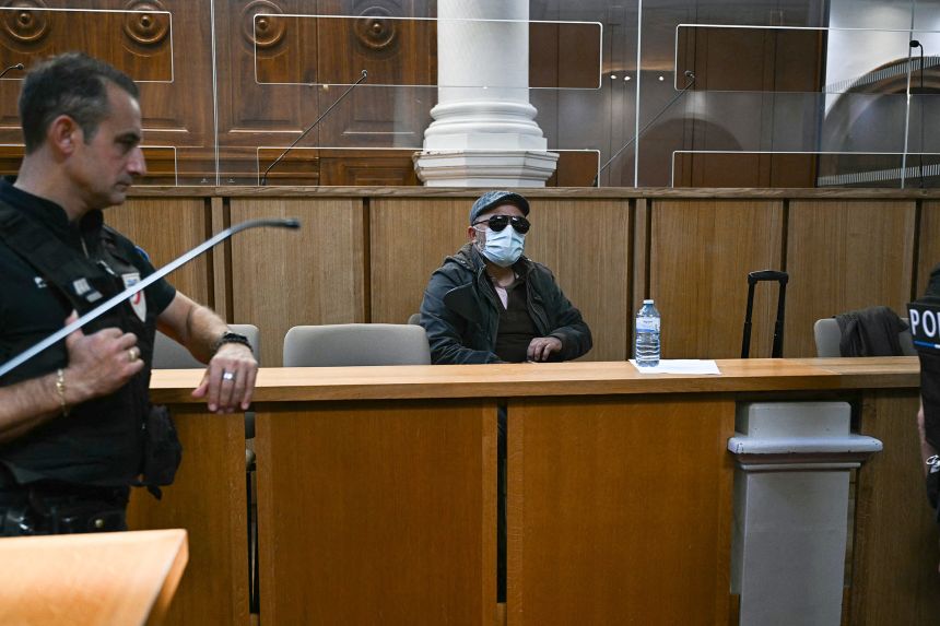 Husamettin Dogan pictured inside the courtroom before the appeal trial.