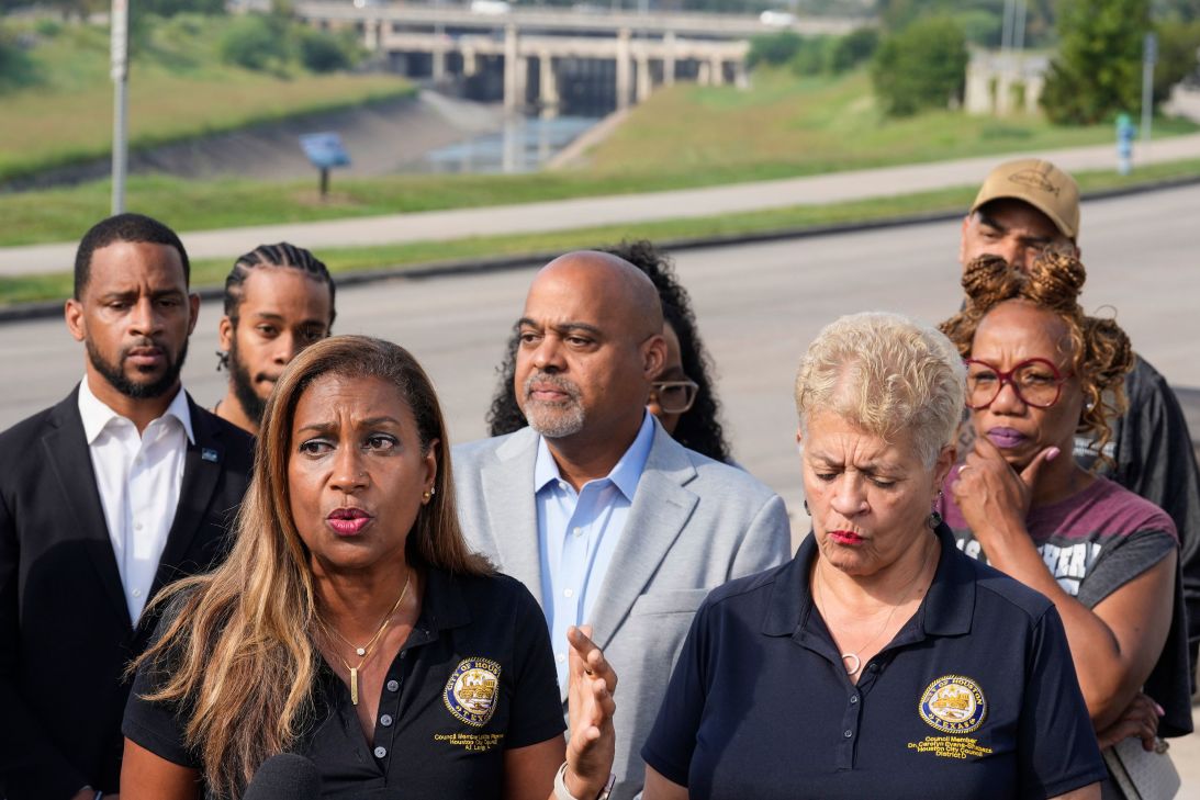 City Council Members Letitia Plummer, left, and Carolyn Evans-Shabazz, get ready for a news conference discussing bayou safety on September 30.