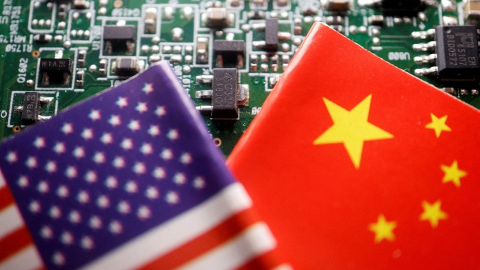 An illustration showing the U.S. and China flags placed on a circuit board with semiconductor chips.