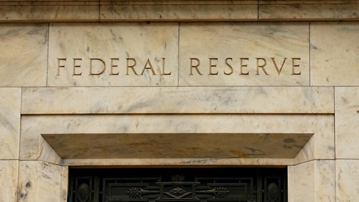The words "Federal Reserve" engraved on the stone facade of the Federal Reserve Building.