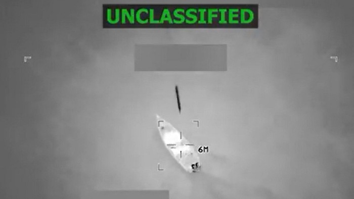 Infrared aerial view shows a targeted vessel in crosshairs on the sea, with "‘Unclassified’ displayed at the top.