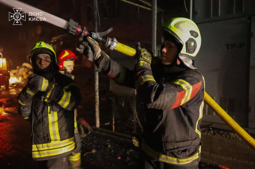 Ukrainian emergency services attend the scene of a Russian attack on Saturday night.