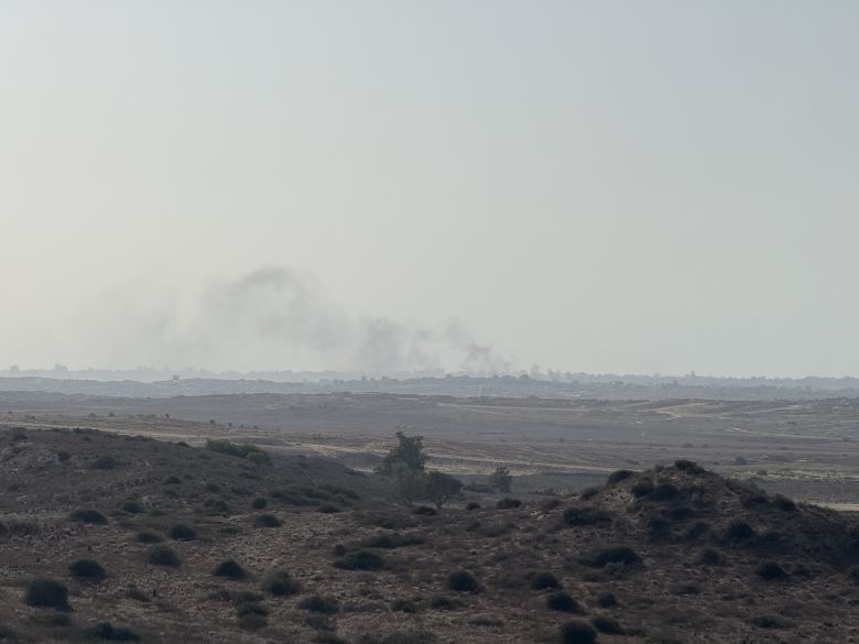 Smoke rising above Gaza as seen from the Sderot observation point in southern Israel. Several rounds of artillery shelling could be heard being fired.