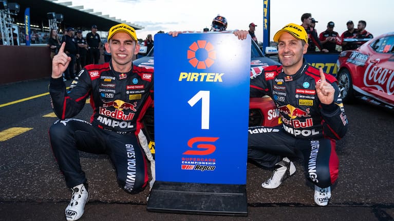 Jamie Whincup driver of the #88 Red Bull Ampol Racing Chevrolet Camaro ZL1 and Broc Feeney driver of the #88 Red Bull Ampol Racing Chevrolet Camaro ZL1 celebrate after winning the Penrite Oil Sandown 500 in 2023. 
