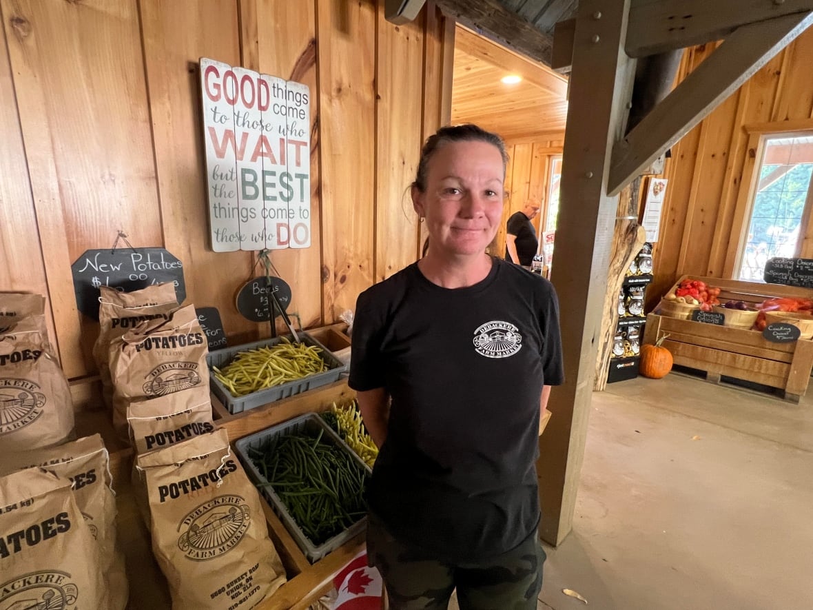 Jen Debacker of Debacker Farm Market near Port Stanley said this fall's summer-like temperatures have helped keep the customers coming in. 