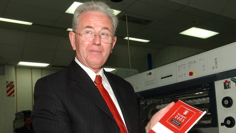 Michael Cullen pictured as he revealed New Zealand's 2003 Budget as the then Minister of Finance.