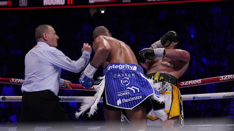Referee Howard Foster stops the fight between Parker and Wardley.