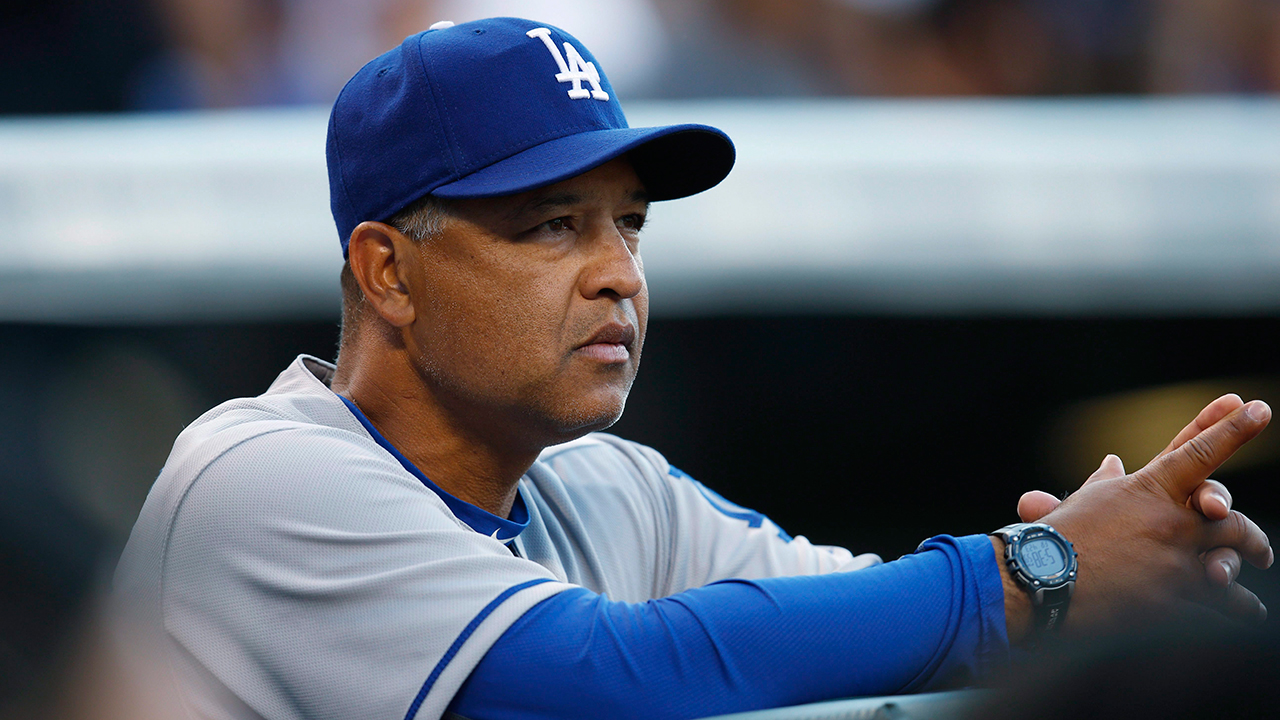 Dodgers manager cites 'delays' after late arrival from Toronto