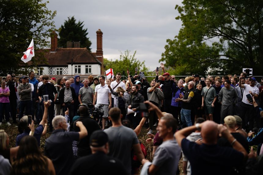 Protesters outside the Bell Hotel in Epping, after police charged Hadush Gerberslasie Kebatu with sexual assault, on July 27.