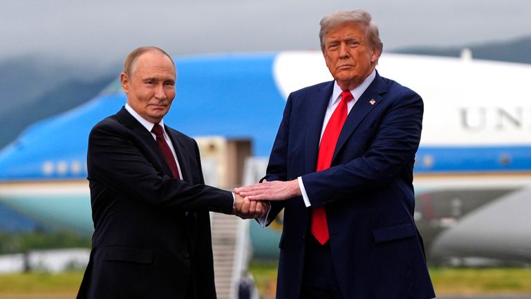 Trump greets Putin on the red carpet in Alaska in August. Pic: AP
