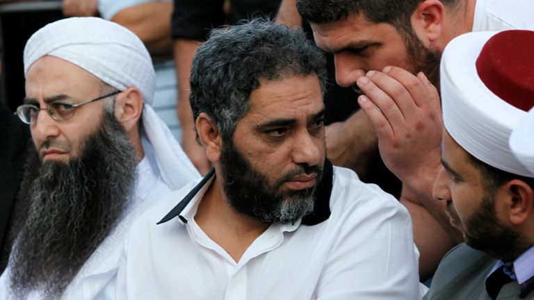 Ahmad al Assir (L) and Shaker (C) at a protest in Beirut in October 2012. Pic: Reuters