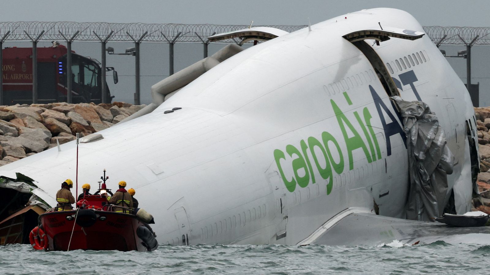 A cargo plane is partially submerged in the sea after veering off the runway. Pic: Reuters