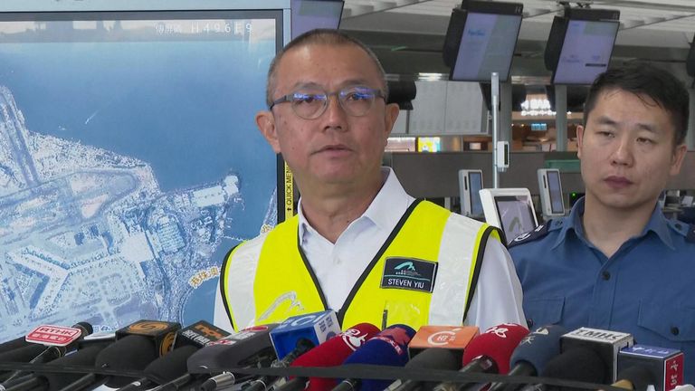 Steven Yiu from Airport Authority Hong Kong told reporters two security staff have been killed. Pic: AP