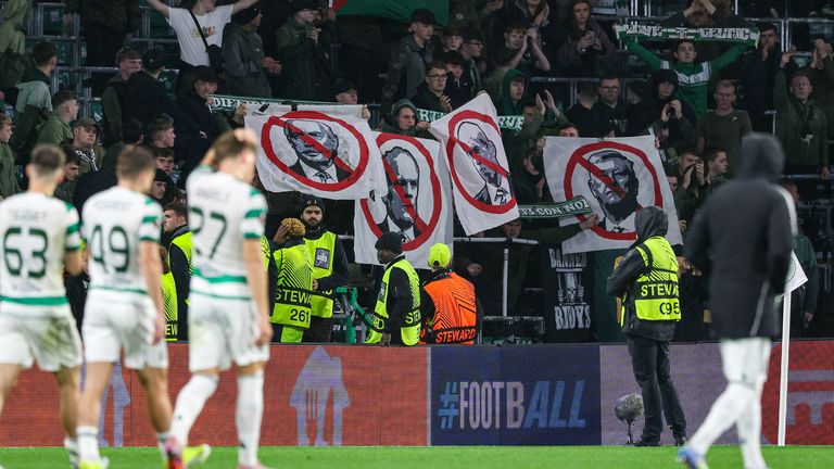 Celtic fans held up banners calling for the removal of Celtic board members at full time