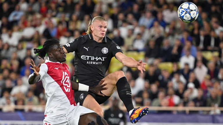 Erling Haaland lobs the Monaco goalkeeper to put Man City ahead in their Champions League tie