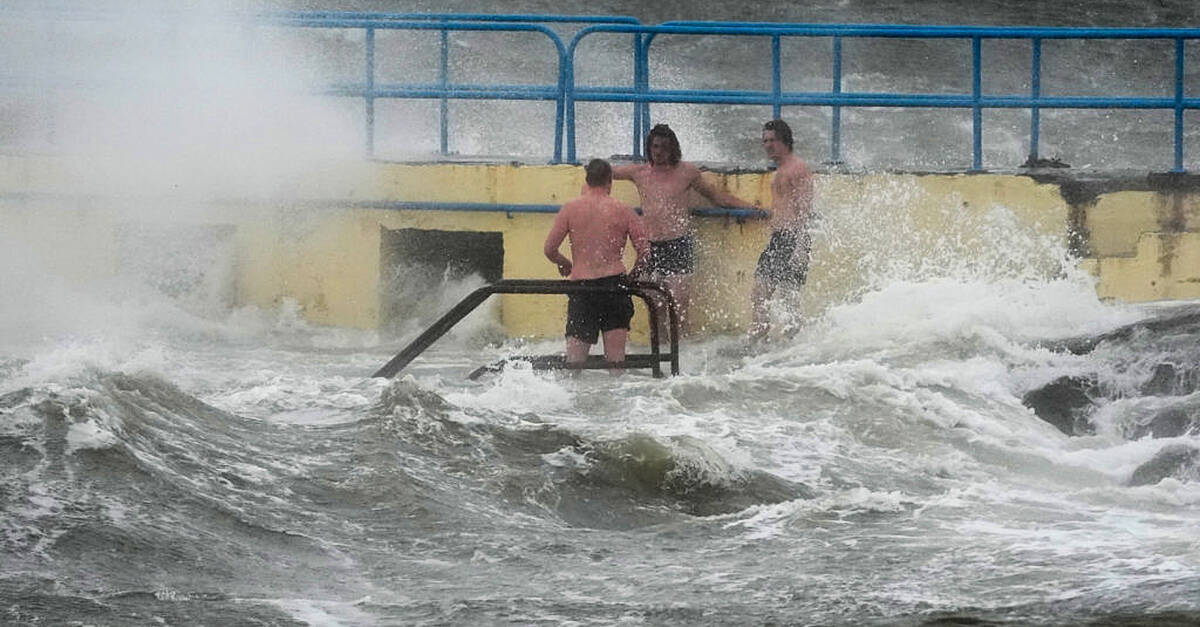 Weather warnings still in place as thousands without power