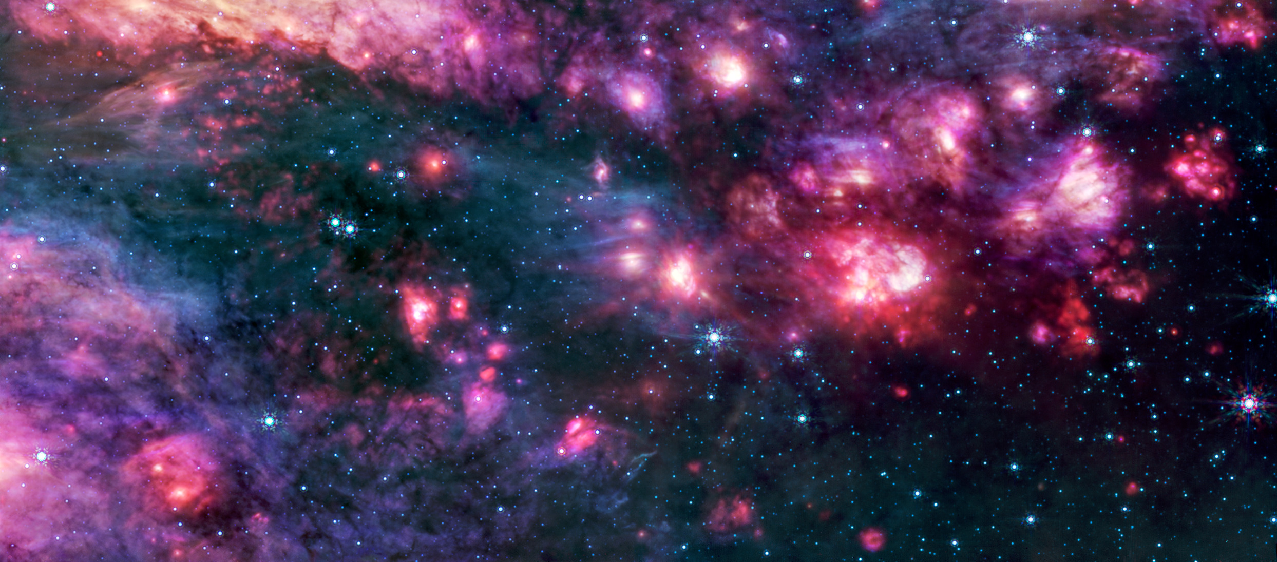 Webb&rsquo;s MIRI (Mid-Infrared Instrument) shows the Sagittarius B2 (Sgr B2) region in mid-infrared light, with warm dust glowing brightly. To the right is one clump of clouds that captured astronomers&rsquo; attention. It is redder than the rest of the clouds in the image and corresponds to an area that other telescopes have shown to be one of the most molecularly rich regions known.