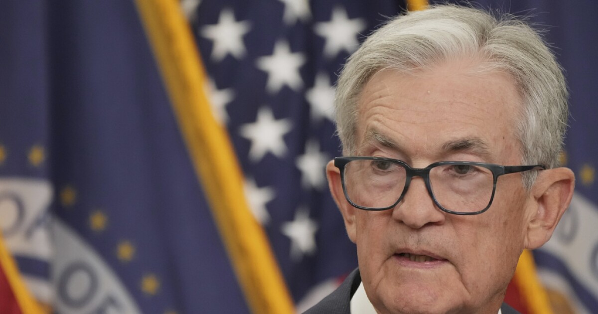 Fed cuts key interest rate again as growth slows and inflation stays high