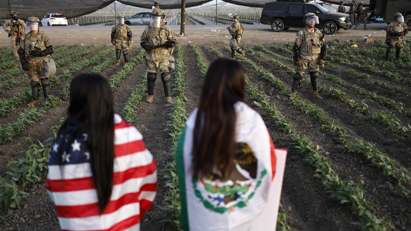 Trump ties crime with immigration, blurring the lines with Guard deployment : NPR