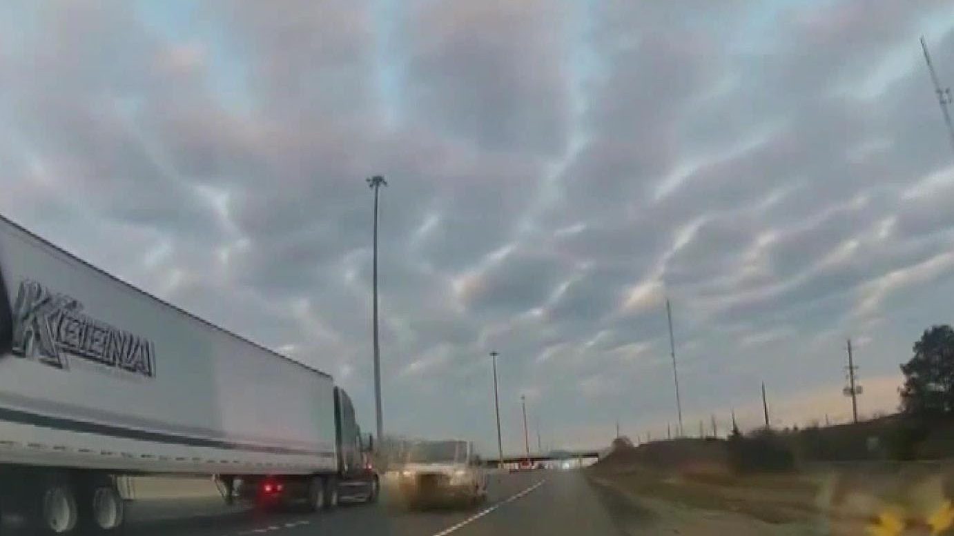 Video still of a cargo van going the wrong way on Highway 401 in Whitby before a crash that killed four people.