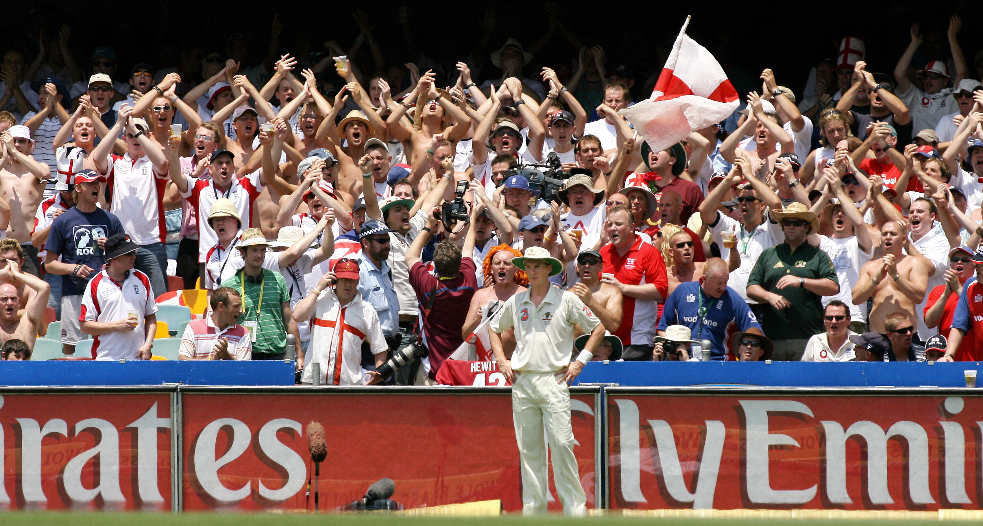 Australian player Brett Lee fields in front of the chanting Barmy Army.