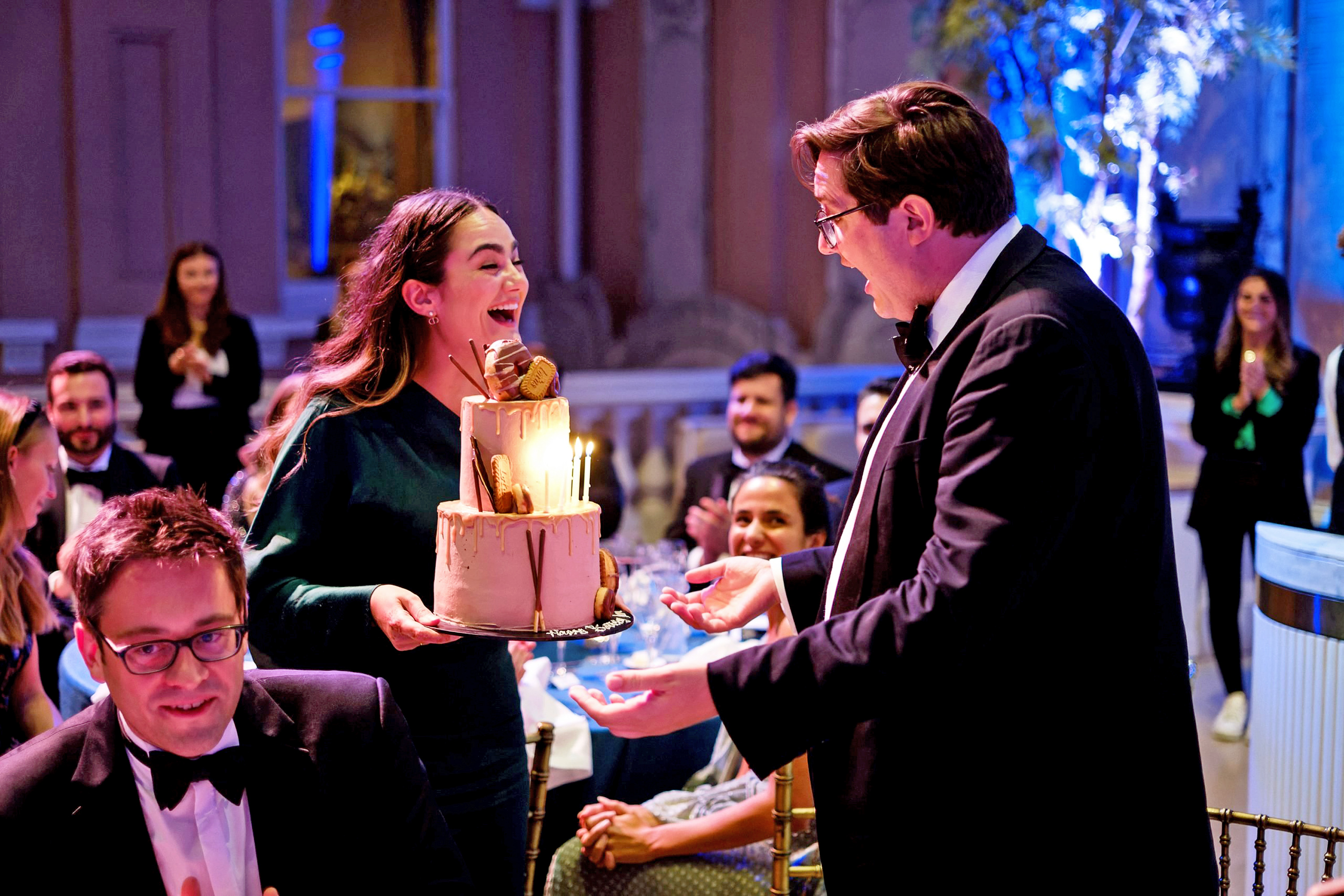 Tom Goodhead being presented with his 40th birthday cake.