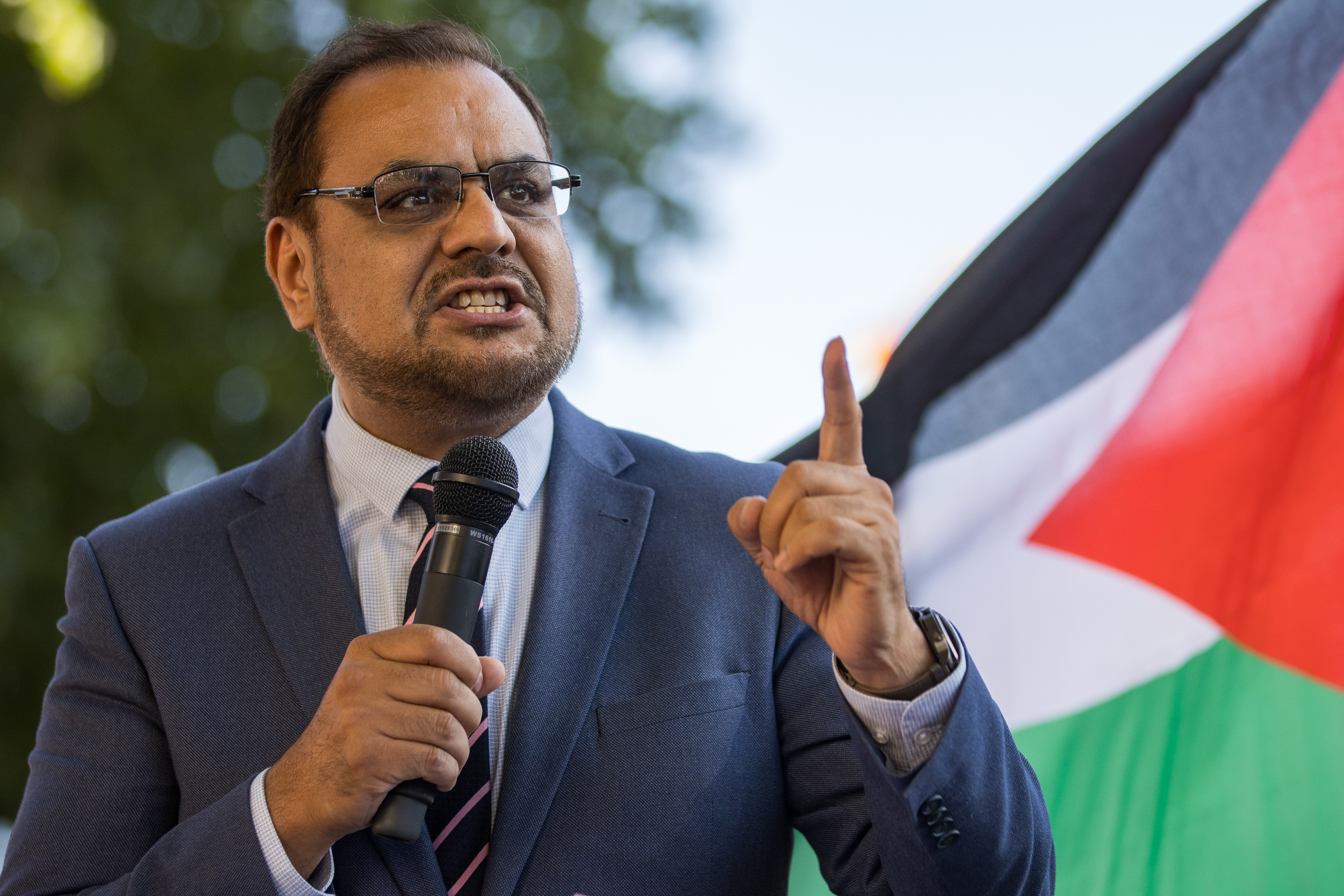 Ayoub Khan, Independent MP for Birmingham Perry Barr, addresses pro-Palestinian activists at a Defend The Right to Protest rally.