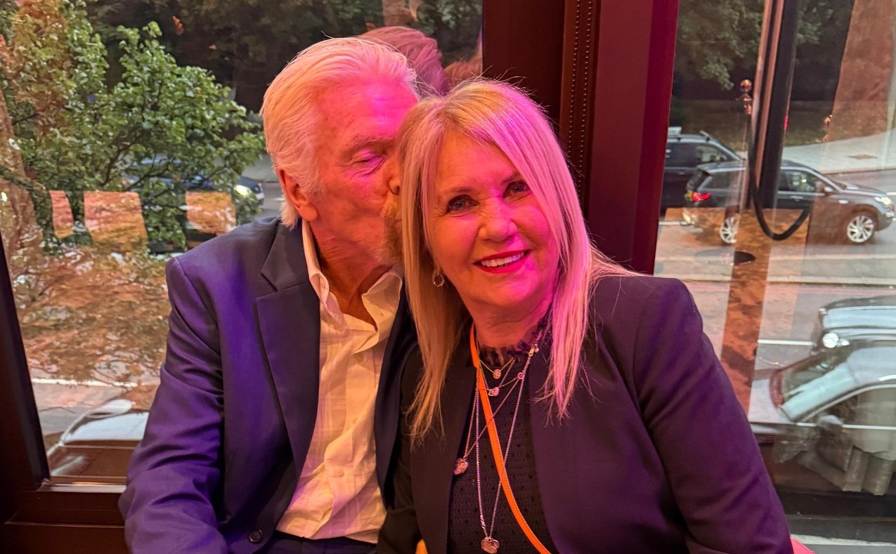 Richard and Joan Branson sitting by a window.