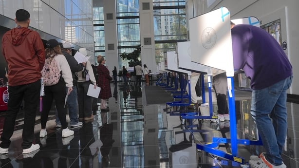 People cast votes at a polling station in New York City