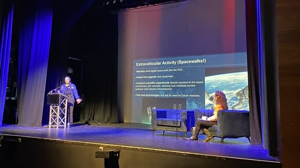 Dr Rosemary Coogan speaking on stage at a science week event in Dundalk