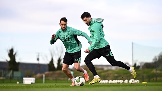 10 November 2025; Mikey Johnston in action against Kevin O'Toole, left, during a Republic of Ireland training session at the FAI National Training Centre in Abbotstown, Dublin. Photo by Stephen McCarthy/Sportsfile