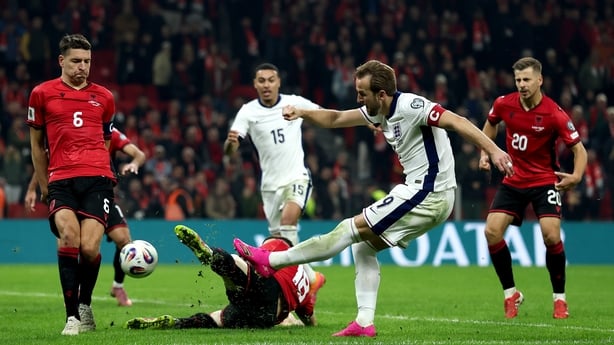 Harry Kane of England shoots under pressure from Ardian Ismajli of Albania during the FIFA World Cup 2026 qualifier match between Albania and England at Air Albania Stadium on November 16, 2025 in Tirana, Albania.