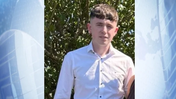 A photograph on a blue background of shay duffy