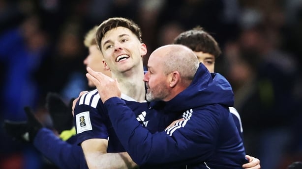 GLASGOW, SCOTLAND - NOVEMBER 18: Scotland's Kieran Tierney celebrates with Scotland Head Coach Steve Clarke after scoring to make it 3-2 during a FIFA World Cup 2026 Qualifier between Scotland and Denmark at Hampden Park, on November 18, 2025, in Glasgow, Scotland. (Photo by Alan Harvey/SNS Group vi