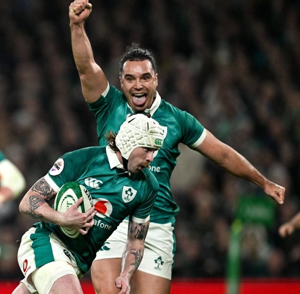 15 November 2025; Mack Hansen of Ireland on his way to scoring his side's second try, as team-mate James Lowe celebrates during the Quilter Nations Series 2025 match between Ireland and Australia at the Aviva Stadium in Dublin. Photo by Ramsey Cardy/Sportsfile