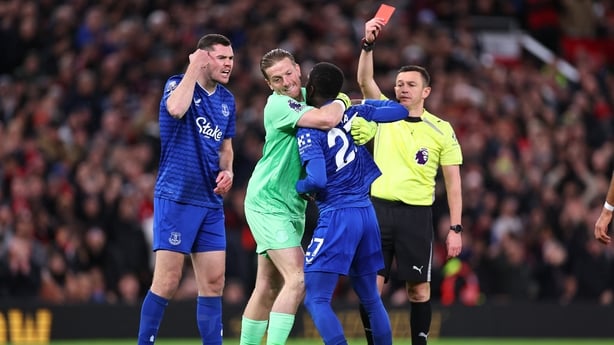 MANCHESTER, ENGLAND - NOVEMBER 24: Idrissa Gueye of Everton receives a red card for a disagreement with Michael Keane of Everton during the Premier League match between Manchester United and Everton at Old Trafford on November 24, 2025 in Manchester, England. (Photo by Robbie Jay Barratt - AMA/Getty