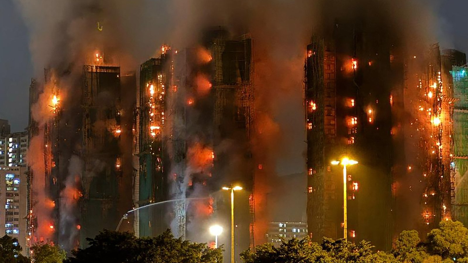Four killed as fire engulfs Hong Kong high-rise