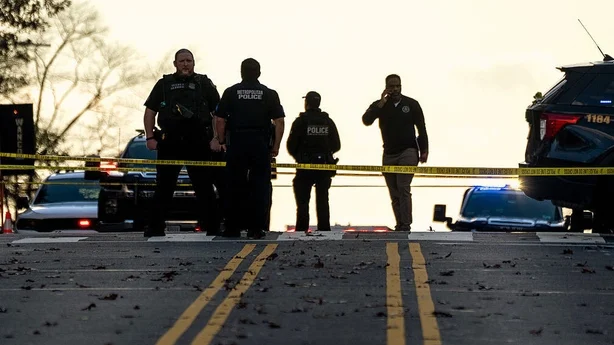 National Guard members put up police crime tape