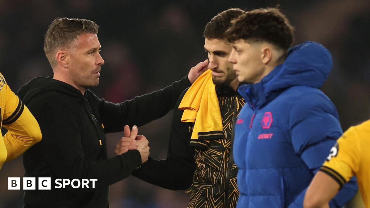Rob Edwards consoles his Wolves players