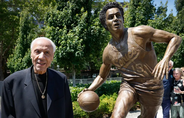 Lenny Wilkens is all smiles moments after he unveiled a 6-foot, 700-pound bronze statue of himself on the west plaza at Climate Pledge Arena in Seattle on Saturday, June 28, 2025. The statue honors him as coach of the Seattle Supersonics leading them to its first NBA title in 1979 and celebrates his community service.