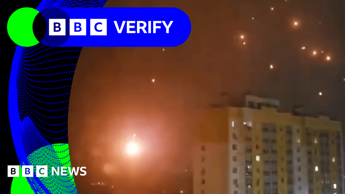 BBC Verify Live: Video captures burning debris falling across Russian city during attack