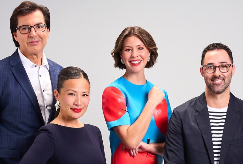Four television presenters pose together against a neutral background, showcasing diverse styles and expressions. The group includes a man in a blue suit, a woman in a black dress, a woman in a vibrant blue dress with red accents, and a man in a striped shirt and dark jacket. This image highlights the dynamic personalities of Australian media.