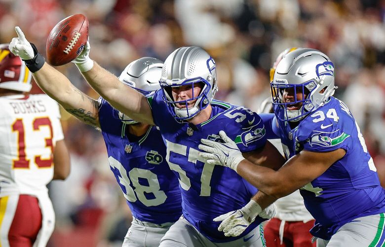 Seattle linebacker Connor O’Toole falls on the Jaylin Lane fumble in the second quarter.  The Seattle Seahawks played the Washington Commanders in NFL Football Sunday, Nov. 2, 2025, at Northwest Stadium, in Landover, MD. 231449