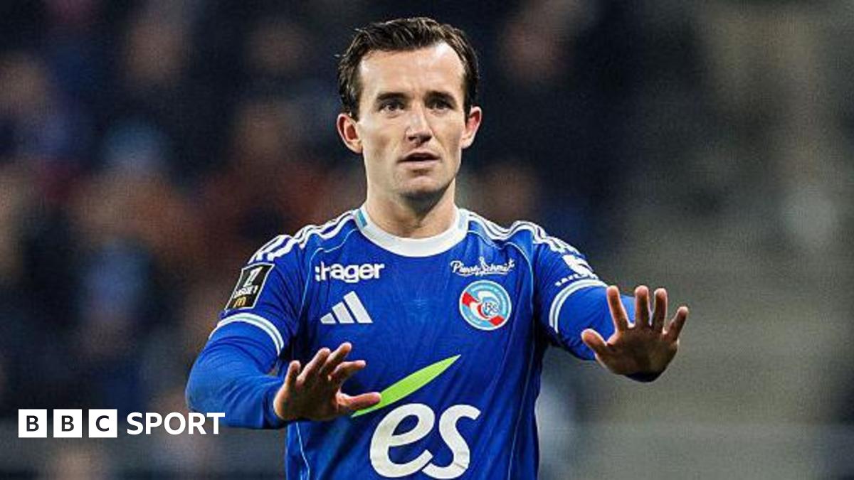 Ben Chilwell gesturing with both hands open to receive the ball while playing for Strasbourg